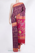 Pure Silk Mauve Tussar Saree with Zari Brocade on the body and Embroidered Border.  displayed on a mannequin