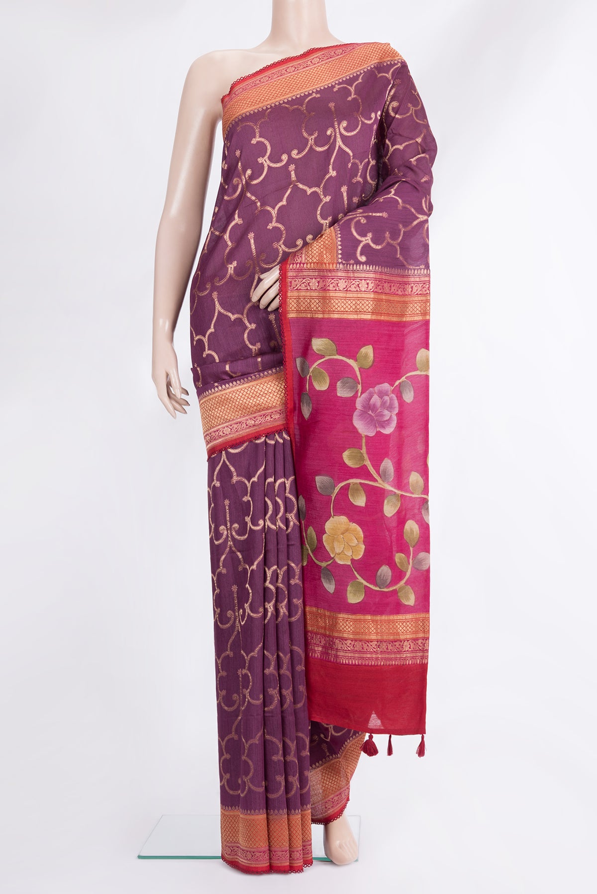 Pure Silk Mauve Tussar Saree with Zari Brocade on the body and Embroidered Border.  displayed on a mannequin