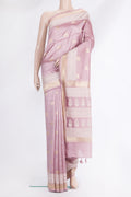 Pure Silk Rose Gold Tussar Saree with Checked design on the body and Embroidered Border.  displayed on a mannequin