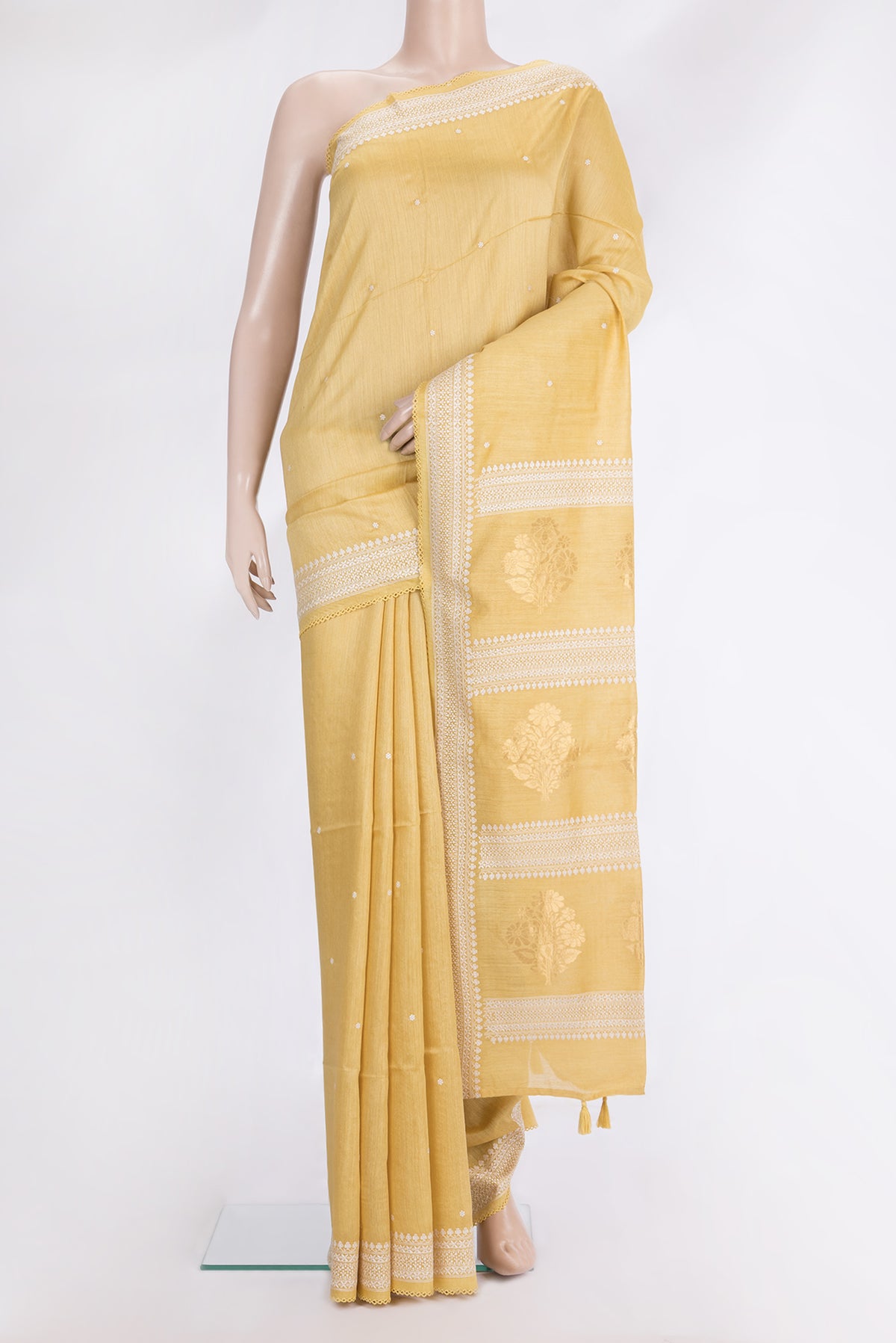 Yellow Tussar Saree with Embroidered on the body and Embroidered Border.  displayed on a mannequin