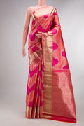 Pure Silk Pink Dual Tone Kanjivaram Saree with Zari Brocade on the body and Fancy Border.  displayed on a mannequin