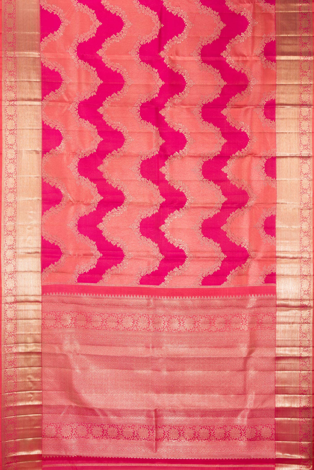 Flat view of Pure Silk Pink Dual Tone Kanjivaram Saree with Zari Brocade on the body and Fancy Border. 