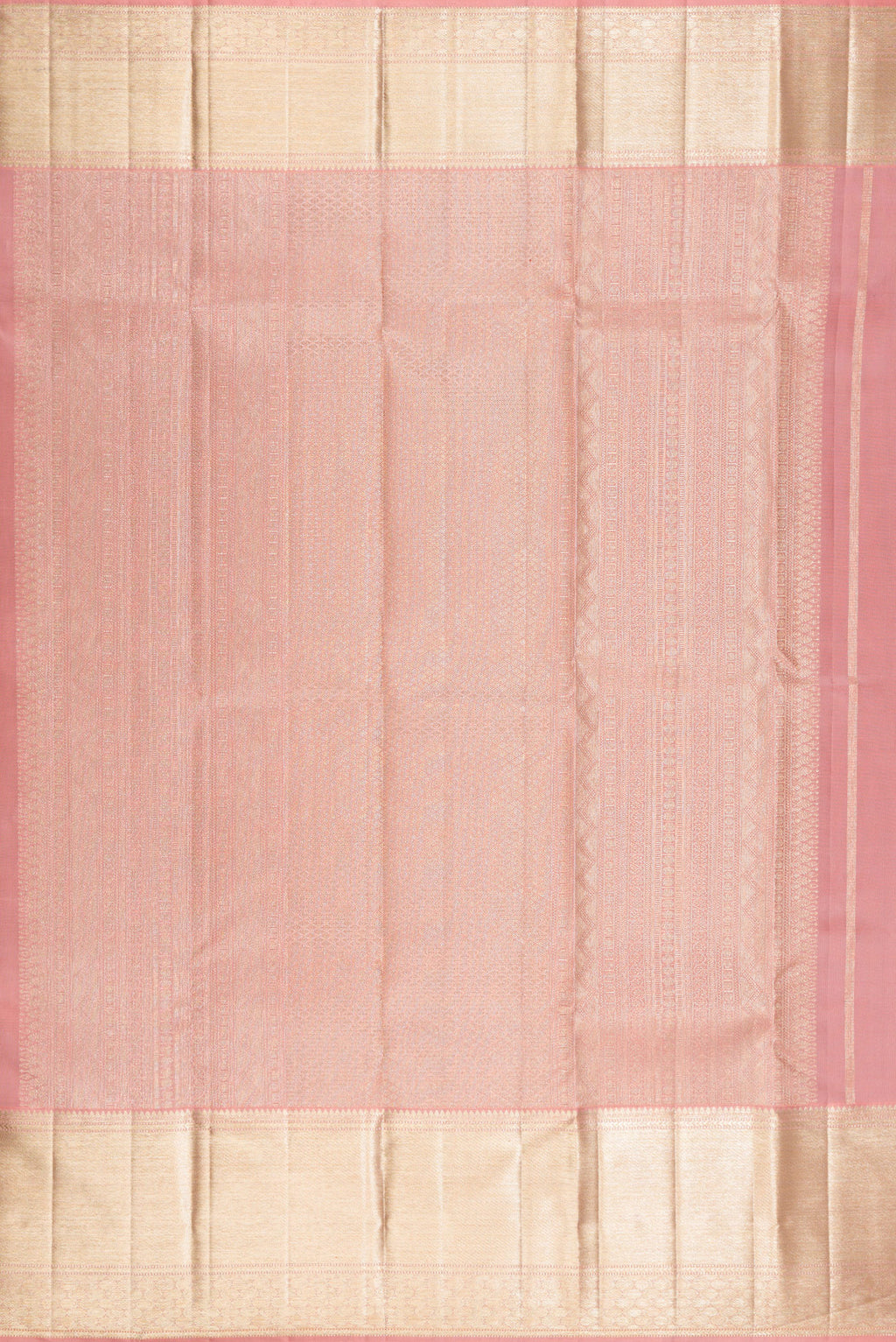 Close up image of the pallu of Pure Silk Rose Gold Dual Tone Kanjivaram Saree with Zari Brocade on the body and Zari Border. 