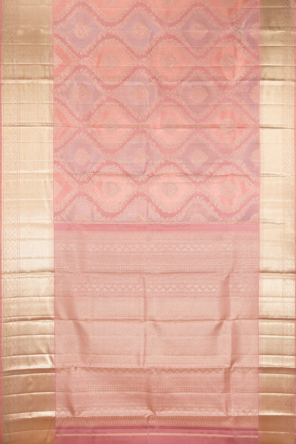 Flat view of Pure Silk Rose Gold Dual Tone Kanjivaram Saree with Zari Brocade on the body and Zari Border. 