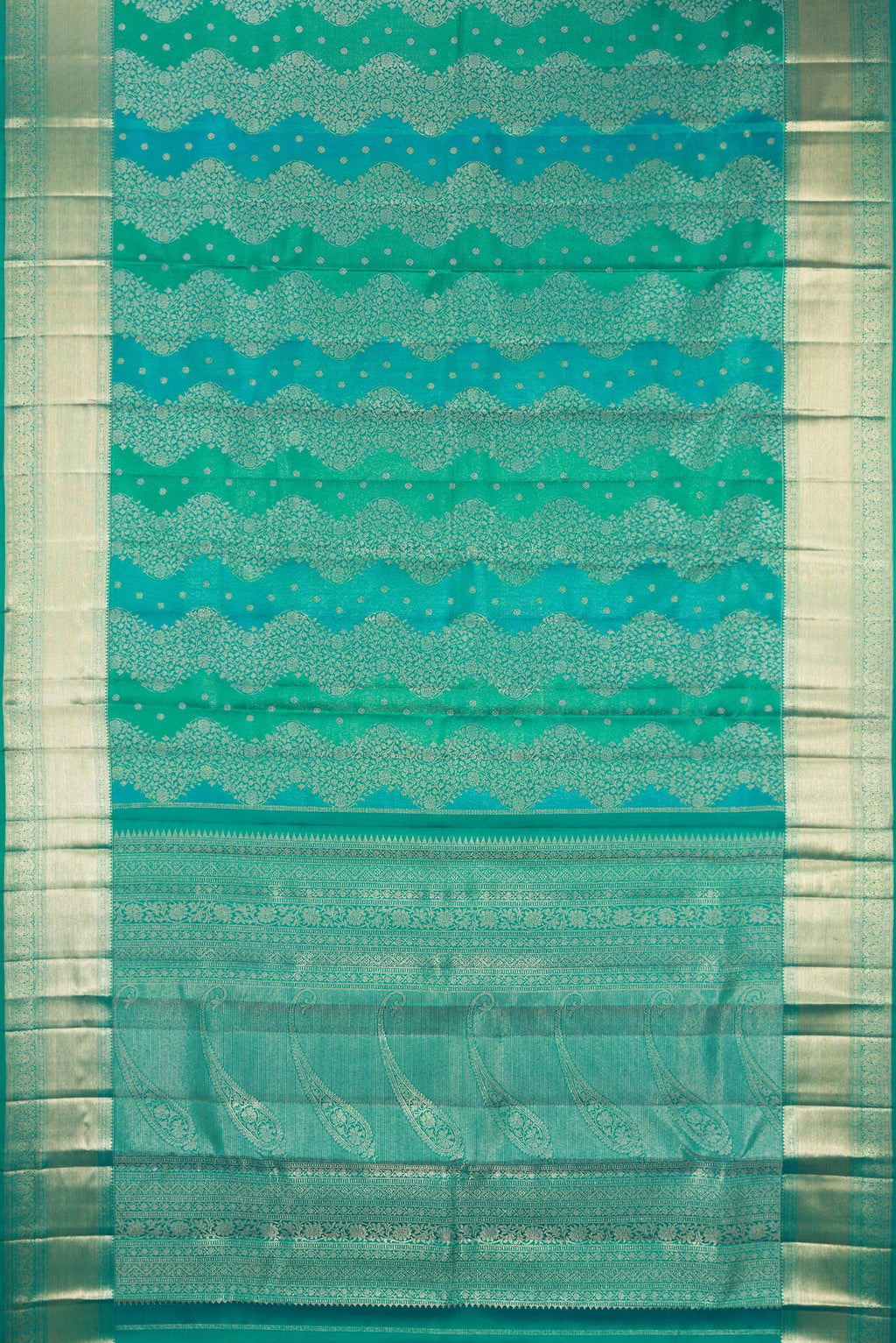 Flat view of Pure Silk Sea Green Dual Tone Kanjivaram Saree with Zari Brocade on the body and Zari Border. 
