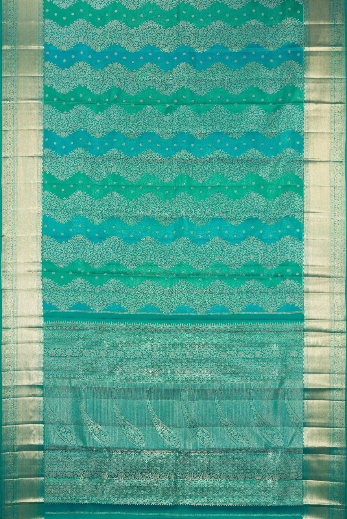 Flat view of Pure Silk Sea Green Dual Tone Kanjivaram Saree with Zari Brocade on the body and Zari Border. 
