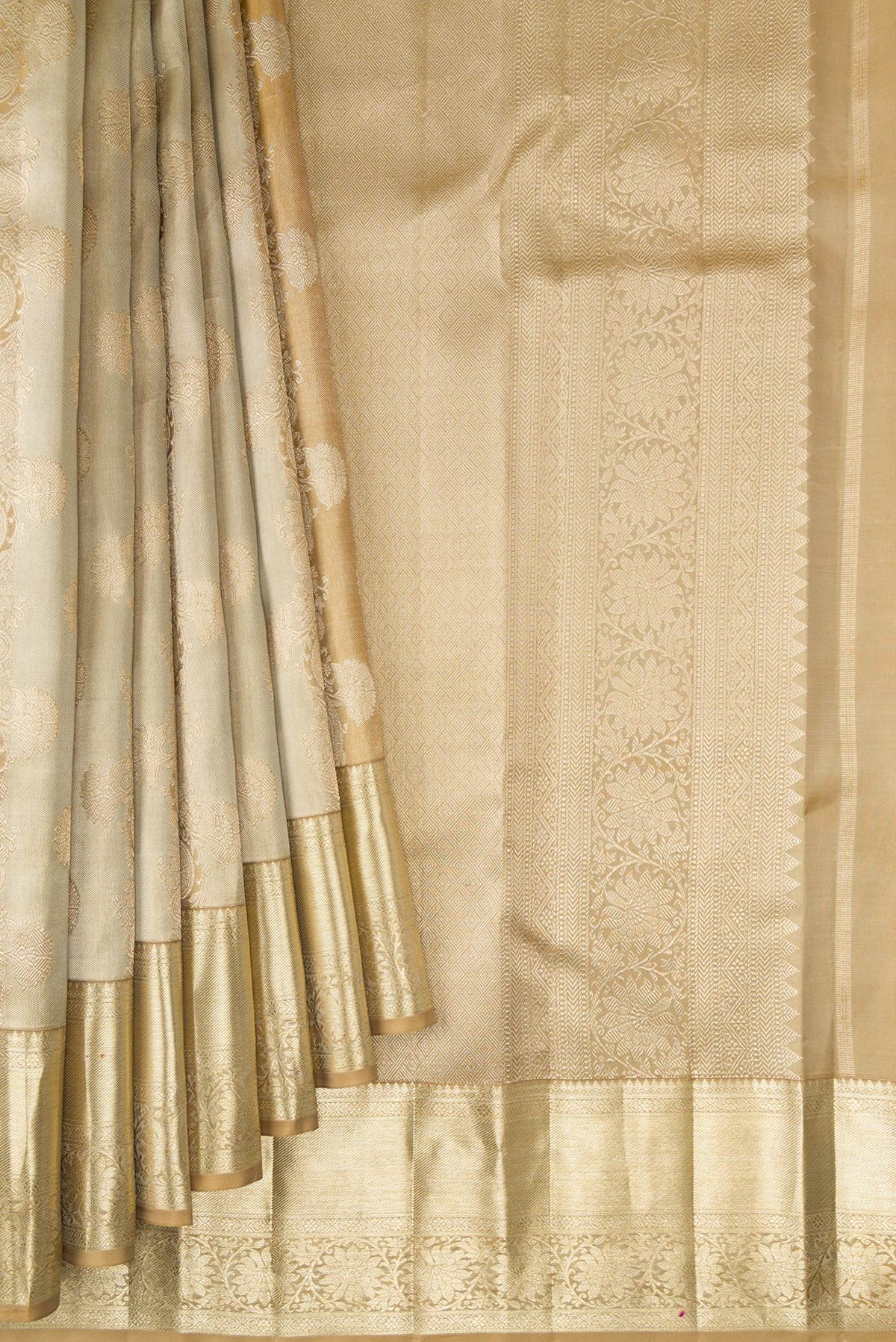 Pleats and pallu of Pure Silk Dark Beige Dual Tone Kanjivaram Saree with Zari Brocade on the body and Zari Border. 