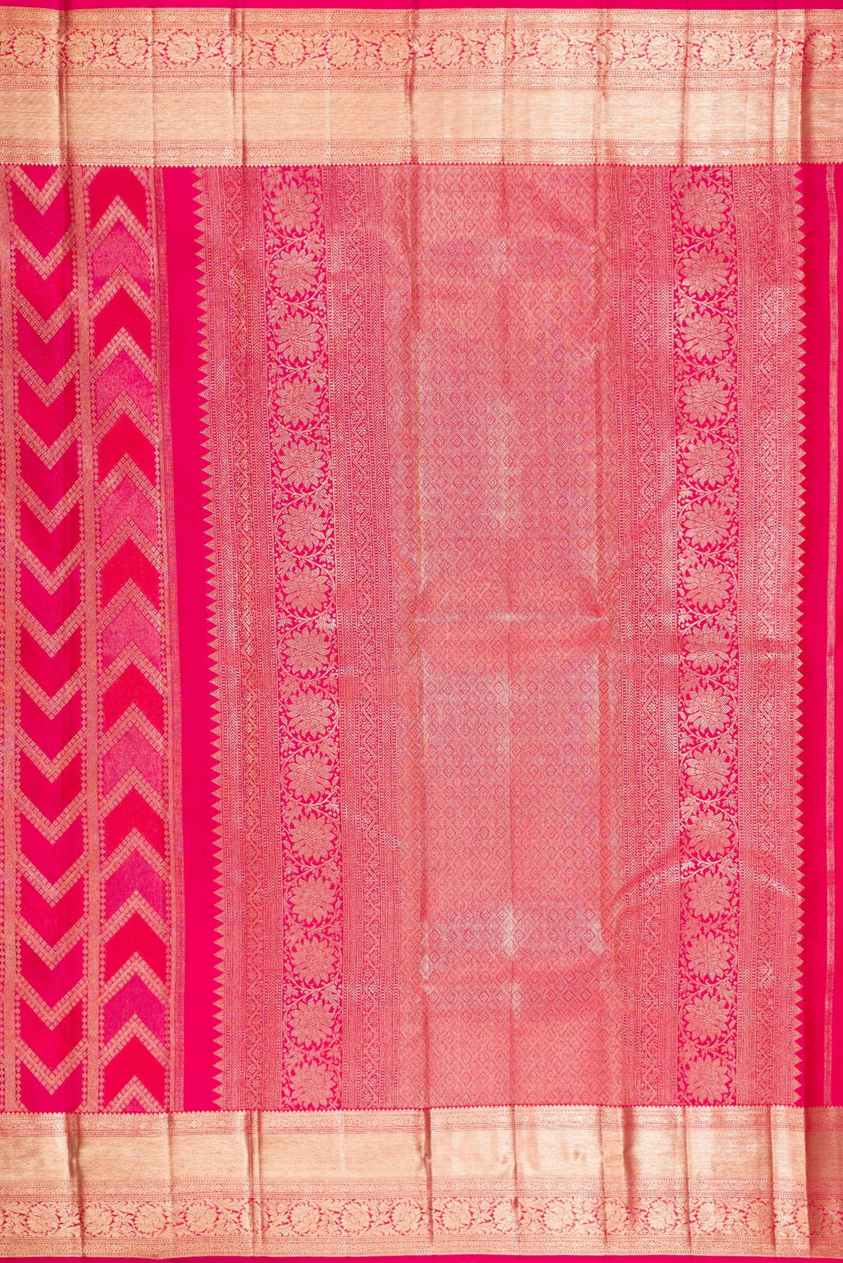 Close up image of the pallu of Pure Silk Dark Pink Kanjivaram Saree with Zari Brocade on the body and Zari Border. 
