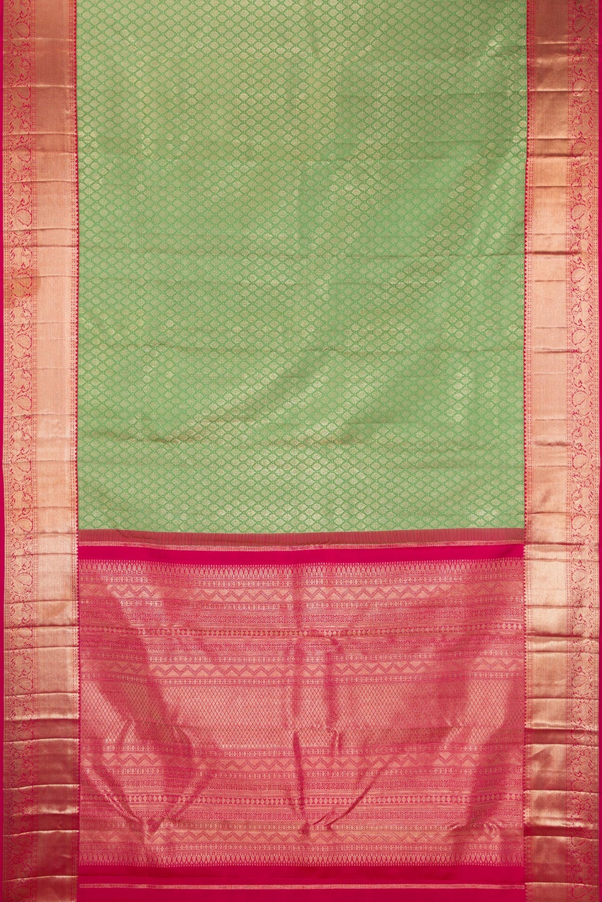 Flat view of Pure Silk Pista Green Kanjivaram Saree with Zari Brocade on the body and Zari Border. 