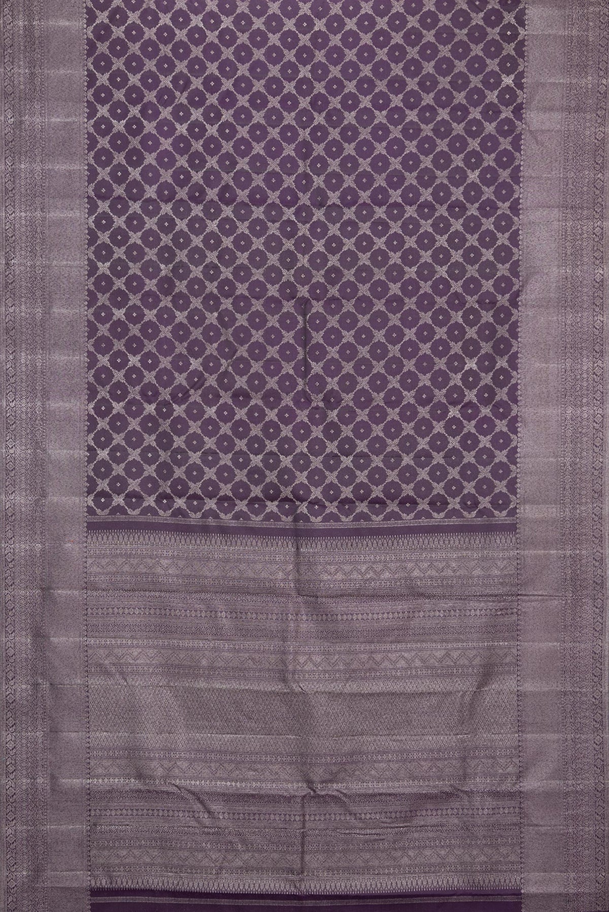 Flat view of Pure Silk Burgundy Dual Tone Kanjivaram Saree with Zari Brocade on the body and Fancy Border. 