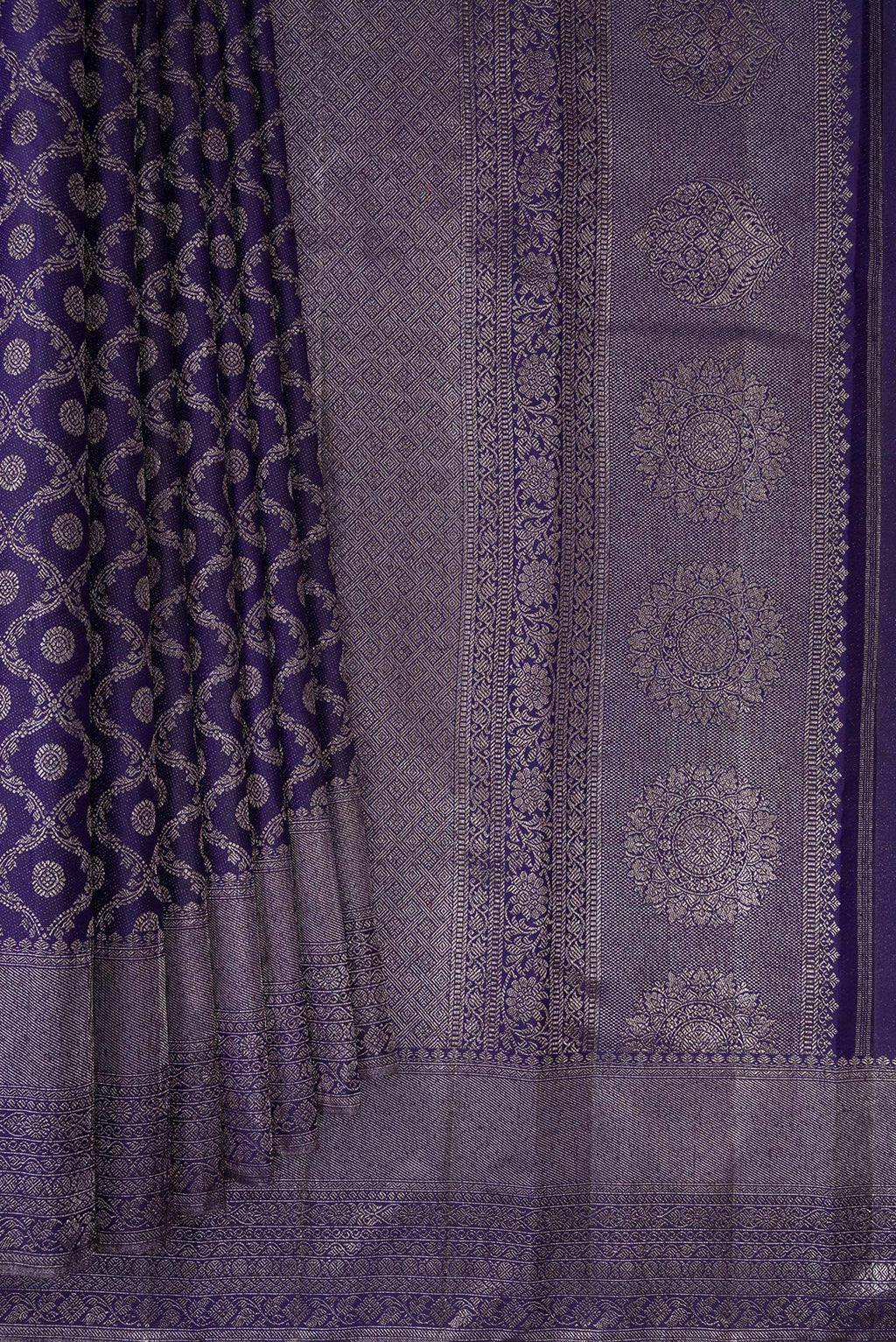 Pleats and pallu of Pure Silk Navy Blue Kanjivaram Saree with Zari Brocade on the body and Fancy Border. 