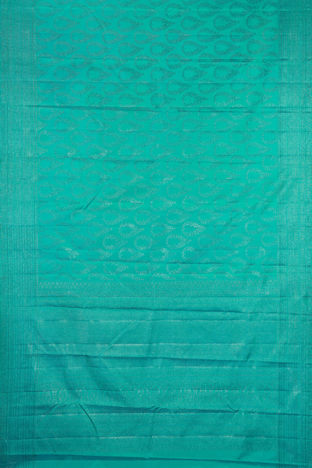 Flat view of Pure Silk Sea Green Dual Tone Kanjivaram Saree with Zari Brocade on the body and Fancy Border. 