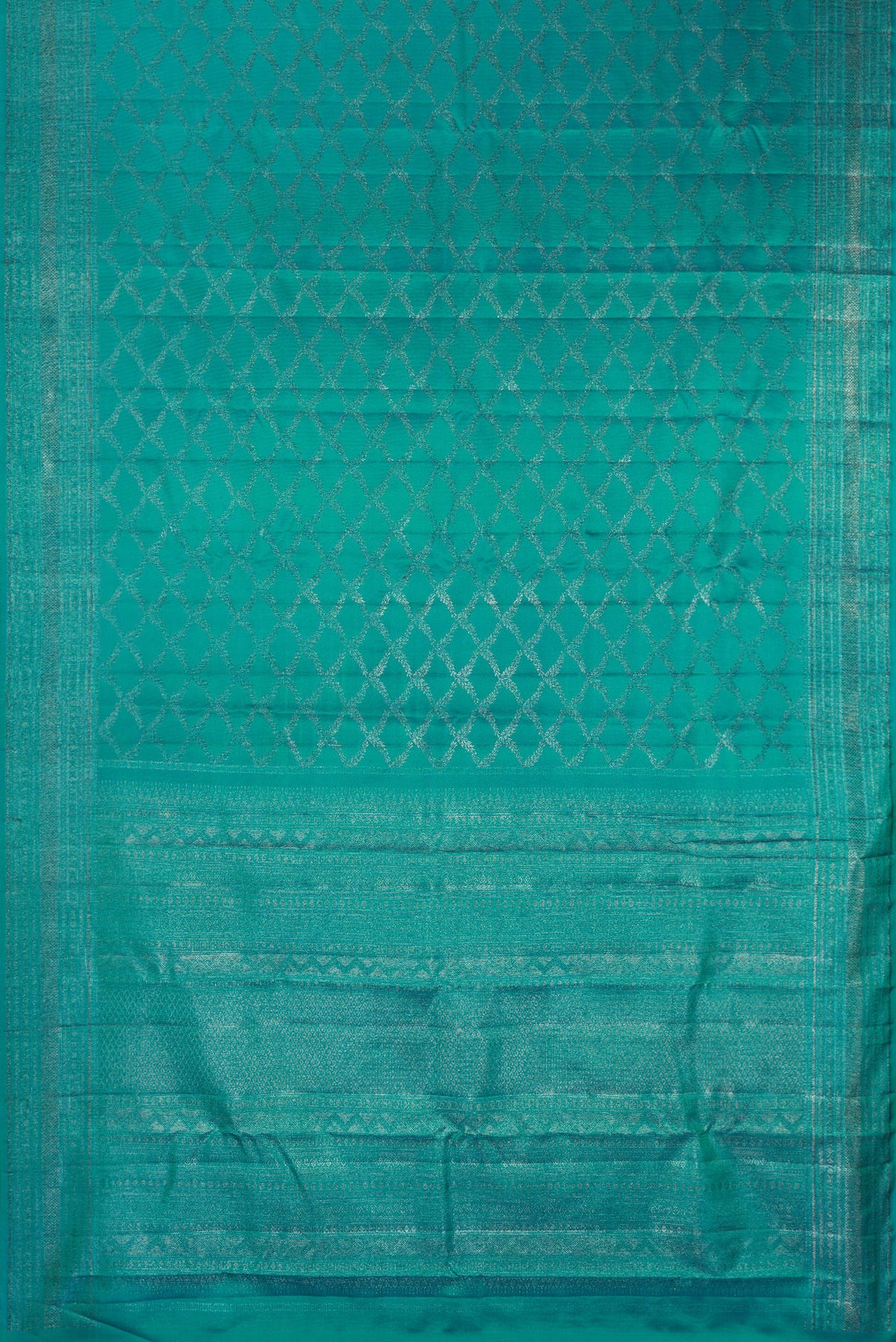 Flat view of Pure Silk Turquoise Kanjivaram Saree with Zari Brocade on the body and Fancy Border. 