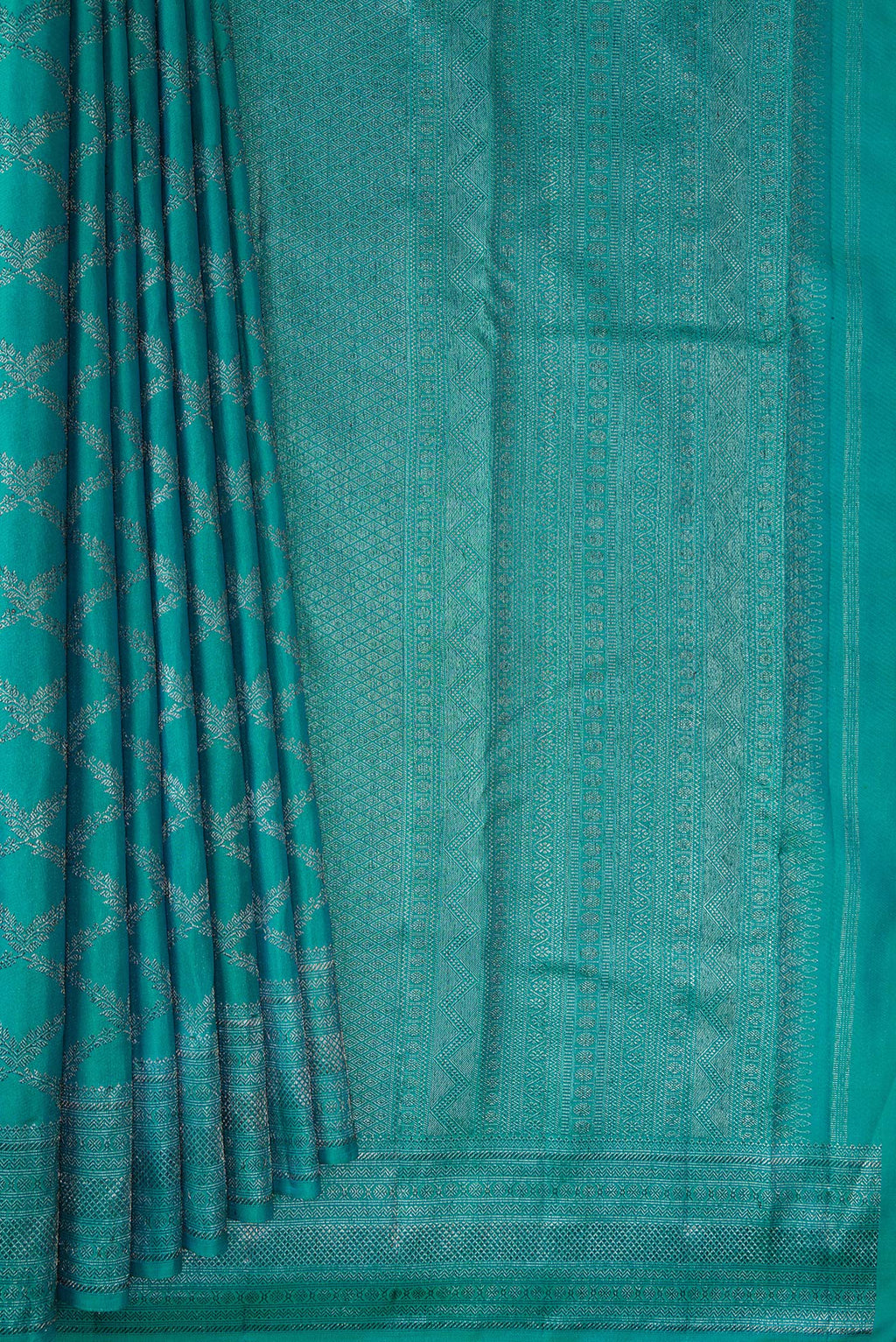 Pleats and pallu of Pure Silk Turquoise Kanjivaram Saree with Zari Brocade on the body and Fancy Border. 