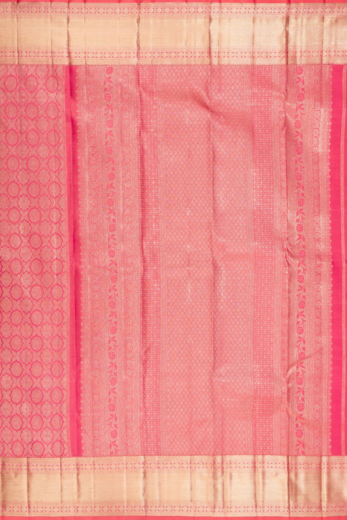 Close up image of the pallu of Pure Silk Coral Dual Tone Kanjivaram Saree with Zari Brocade on the body and Zari Border. 
