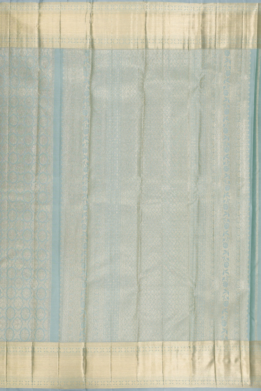 Close up image of the pallu of Pure Silk Grey Kanjivaram Saree with Zari Brocade on the body and Zari Border. 