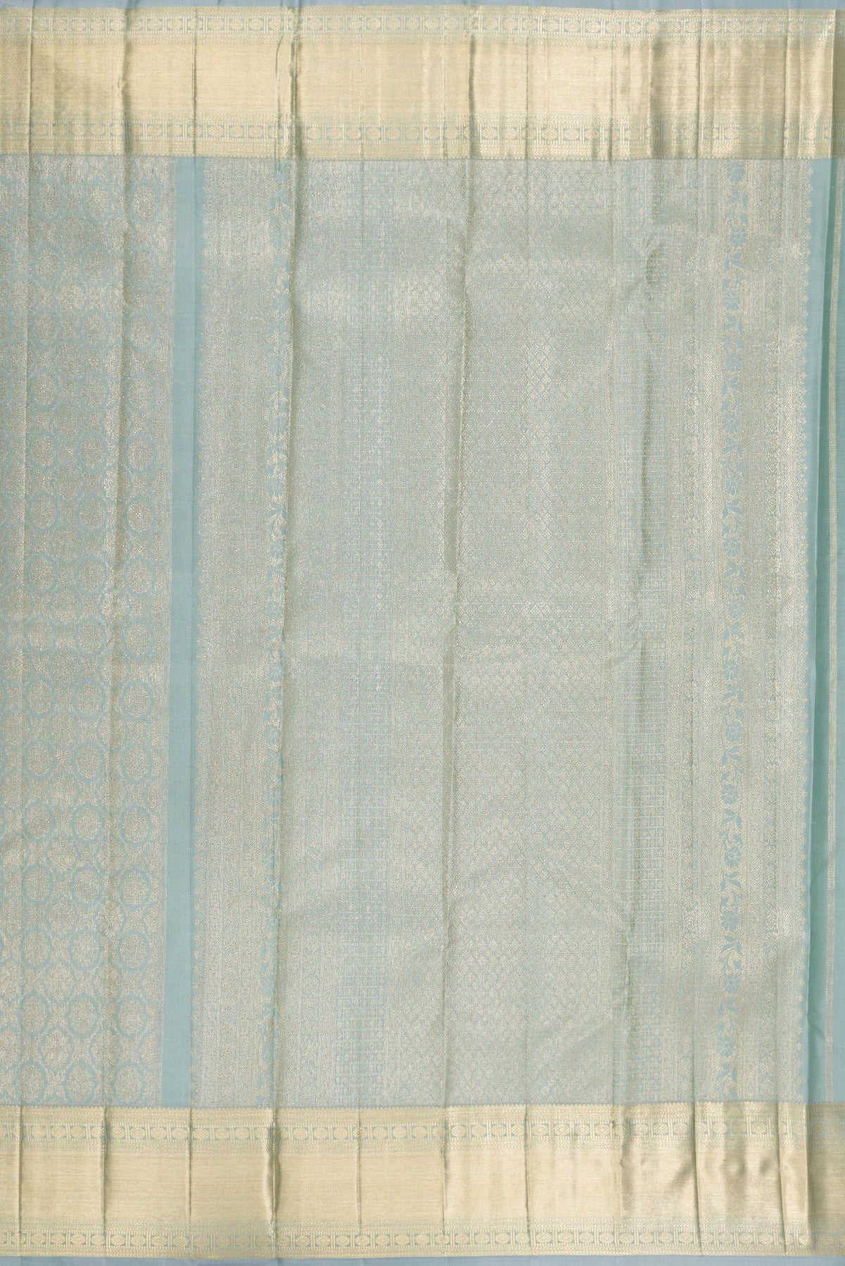 Close up image of the pallu of Pure Silk Grey Kanjivaram Saree with Zari Brocade on the body and Zari Border. 