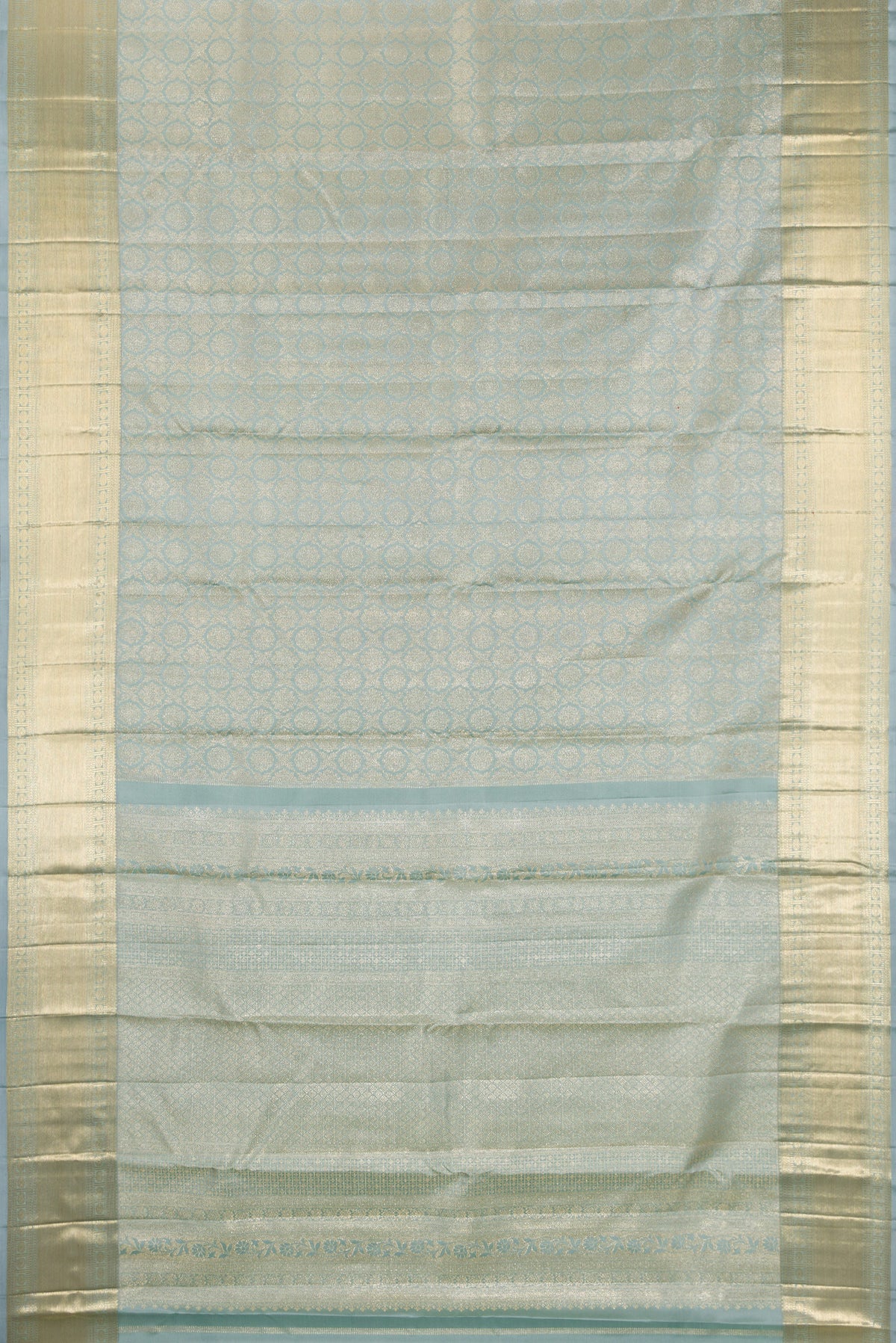Flat view of Pure Silk Grey Kanjivaram Saree with Zari Brocade on the body and Zari Border. 