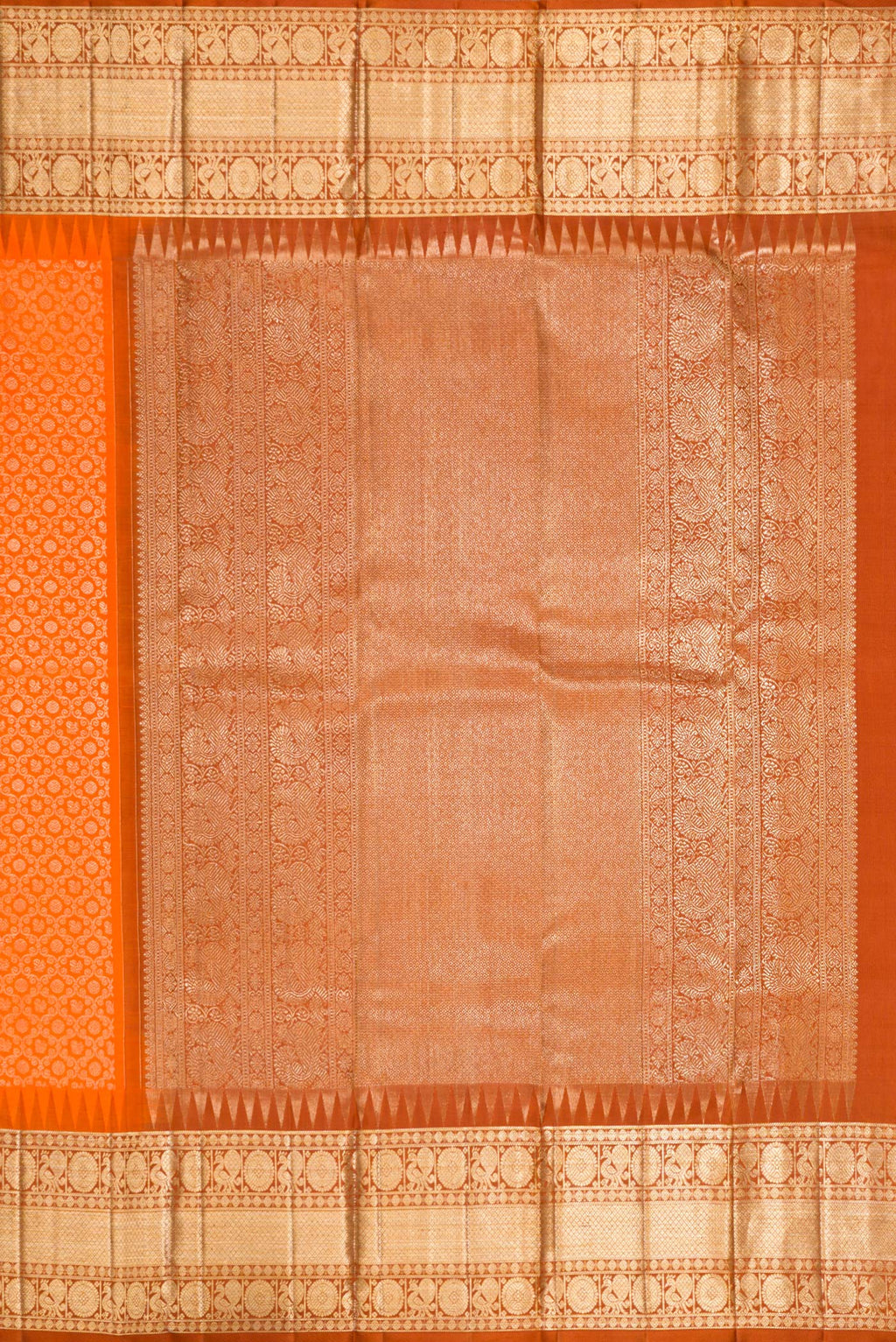 Close up image of the pallu of Pure Silk Orange Kanchipuram Saree with Zari Brocade on the body and Fancy Border. 