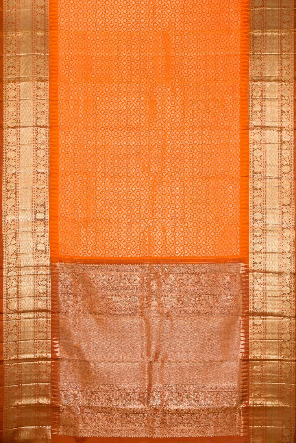 Flat view of Pure Silk Orange Kanchipuram Saree with Zari Brocade on the body and Fancy Border. 