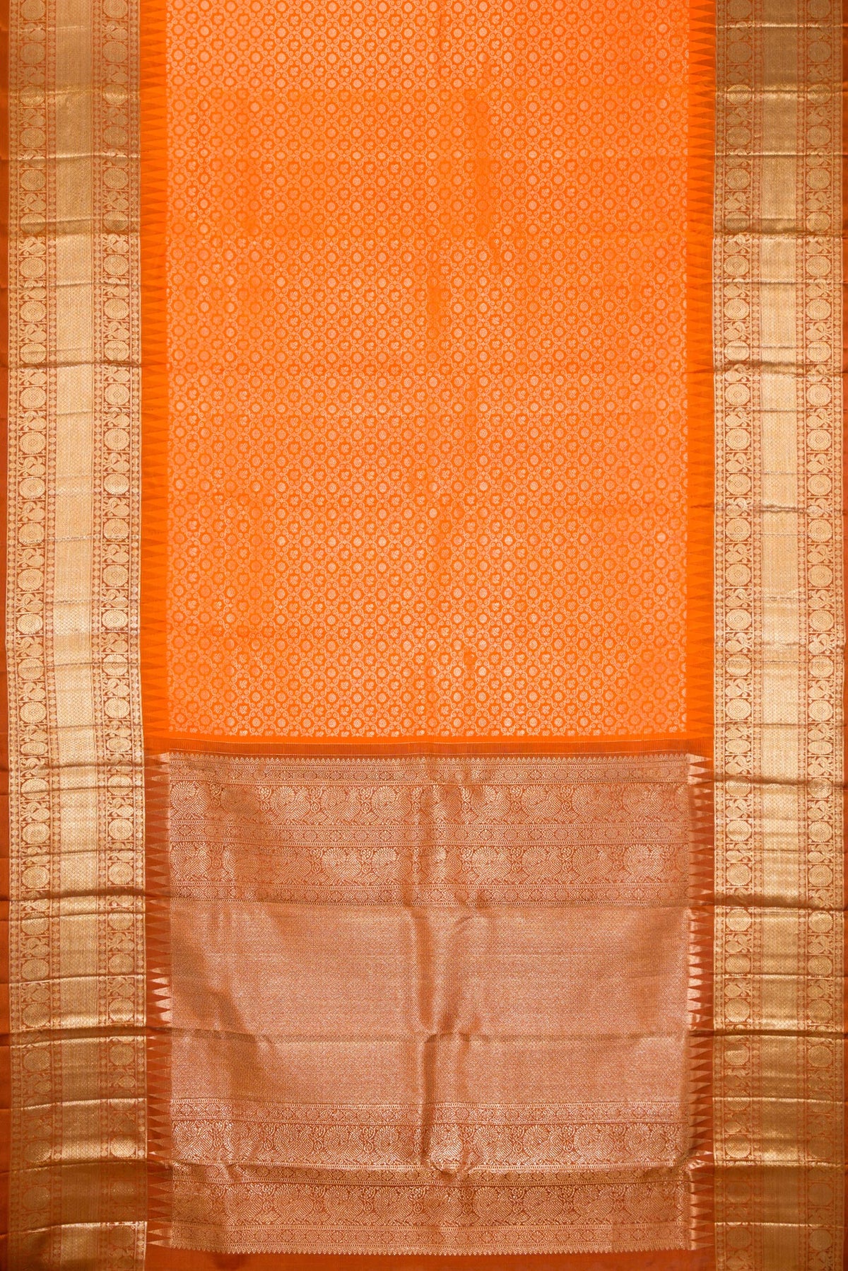 Flat view of Pure Silk Orange Kanchipuram Saree with Zari Brocade on the body and Fancy Border. 