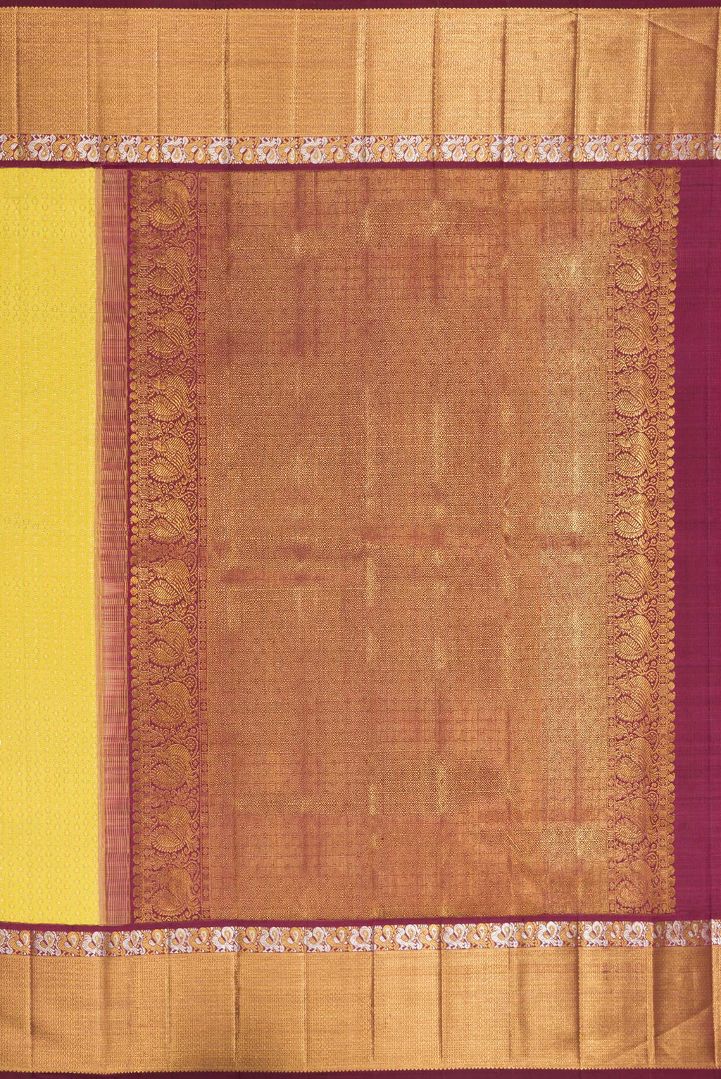 Close up image of the pallu of Pure Silk Yellow Dual Tone Kanchipuram Saree with Zari Brocade on the body and Zari Border. 