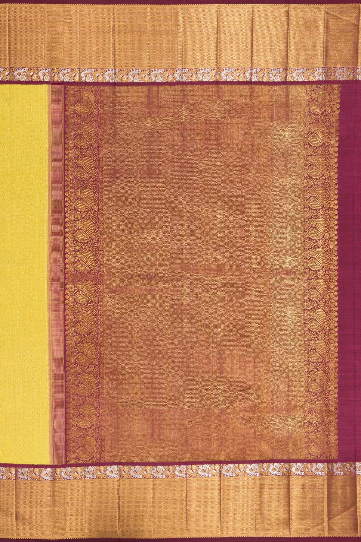 Close up image of the pallu of Pure Silk Yellow Dual Tone Kanchipuram Saree with Zari Brocade on the body and Zari Border. 