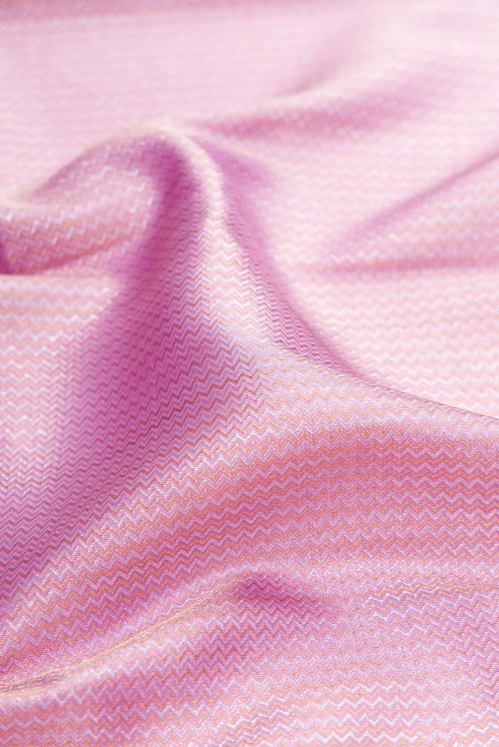 Close up of Pure Silk Lavender Dual Tone Kanchipuram Saree with Zari Brocade on the body and Zari Border.  displaying folds