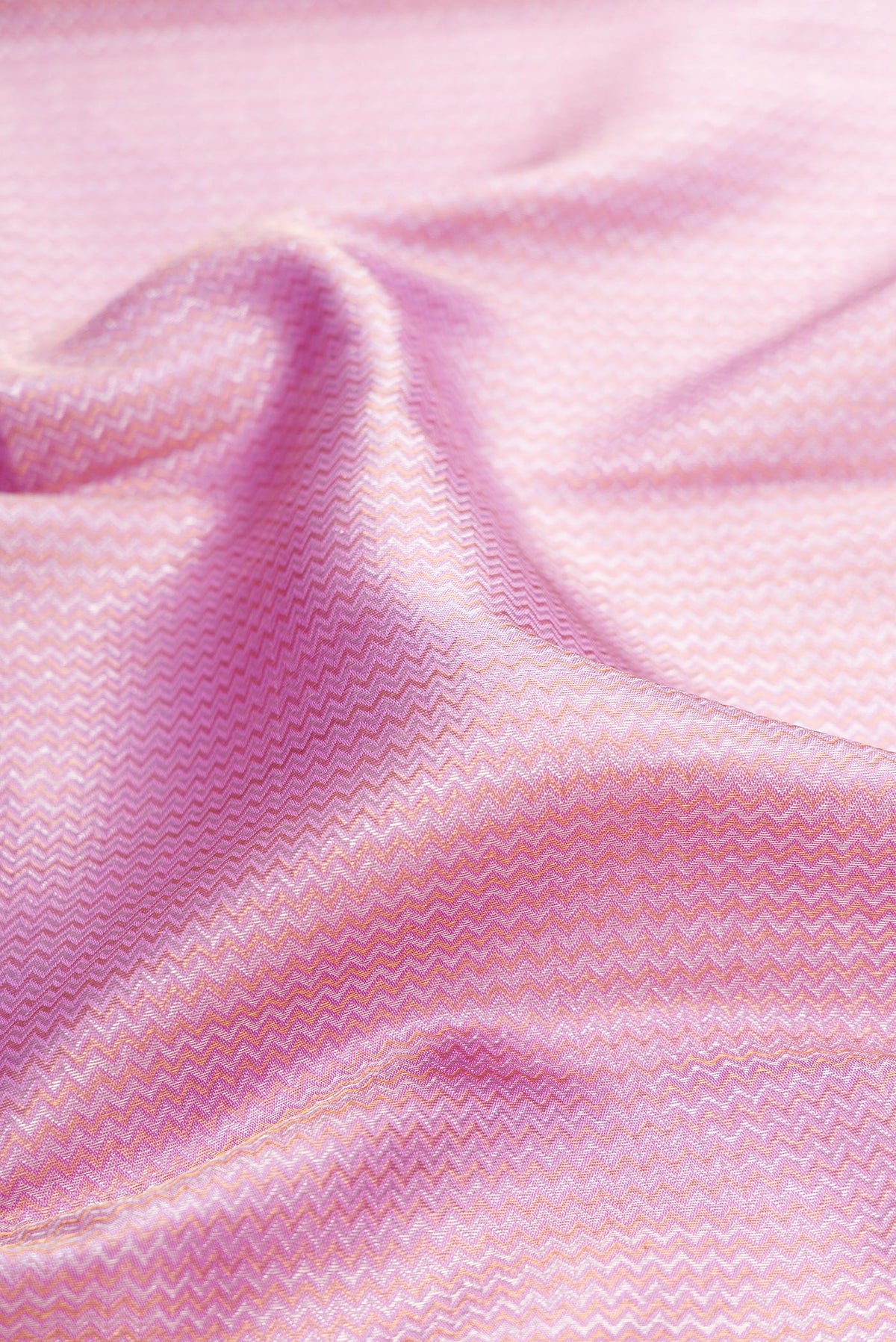 Close up of Pure Silk Lavender Dual Tone Kanchipuram Saree with Zari Brocade on the body and Zari Border.  displaying folds