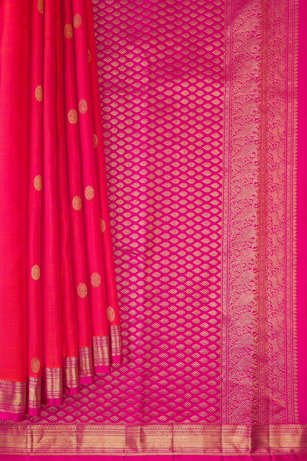 Pleats and pallu of Pure Silk Coral Dual Tone Kanjivaram Saree with Zari Butta on the body and Zari Border. 