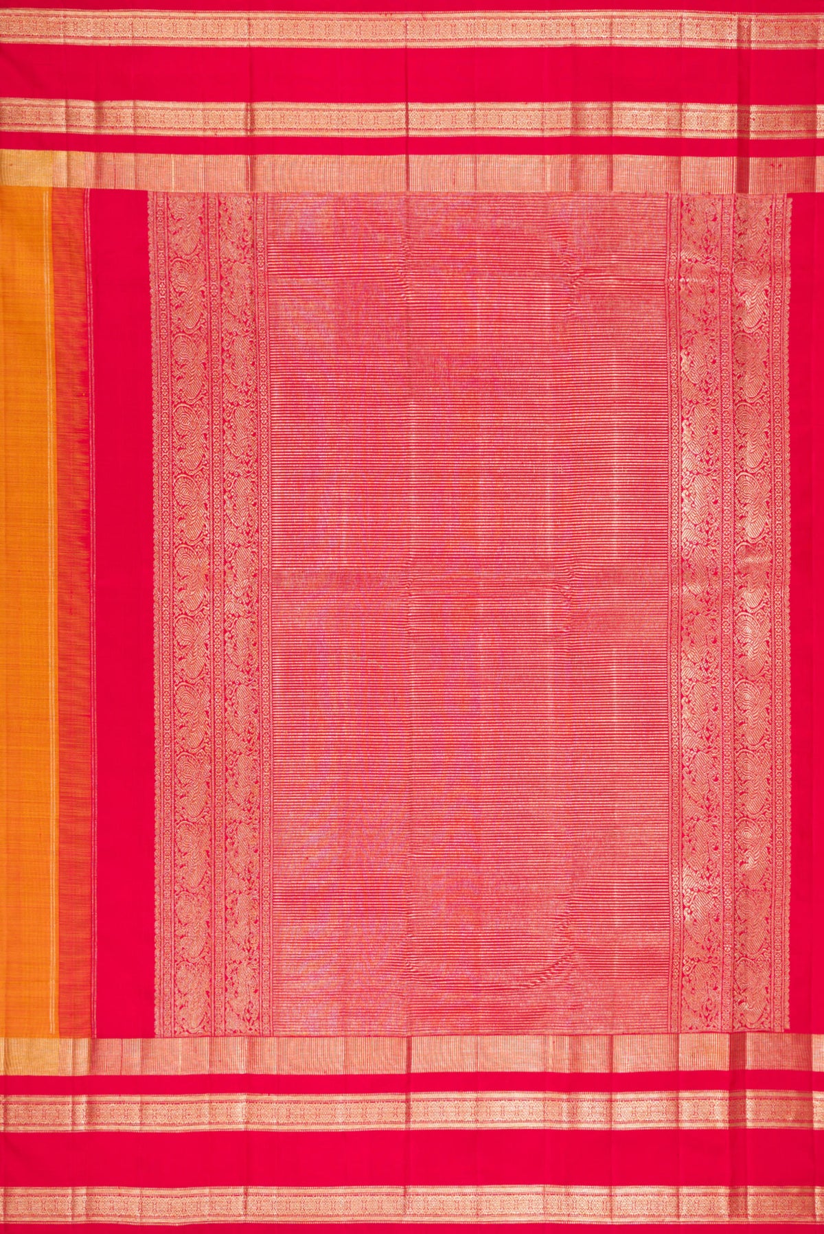 Close up image of the pallu of Pure Silk Mustard Kanjivaram Saree with Zari Butta on the body and Zari Border. 
