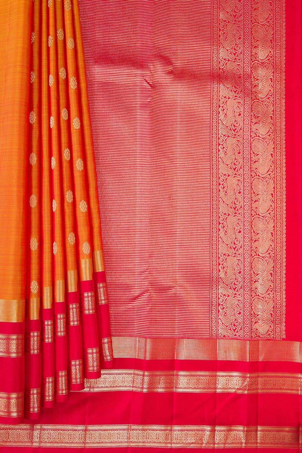Pleats and pallu of Pure Silk Mustard Kanjivaram Saree with Zari Butta on the body and Zari Border. 