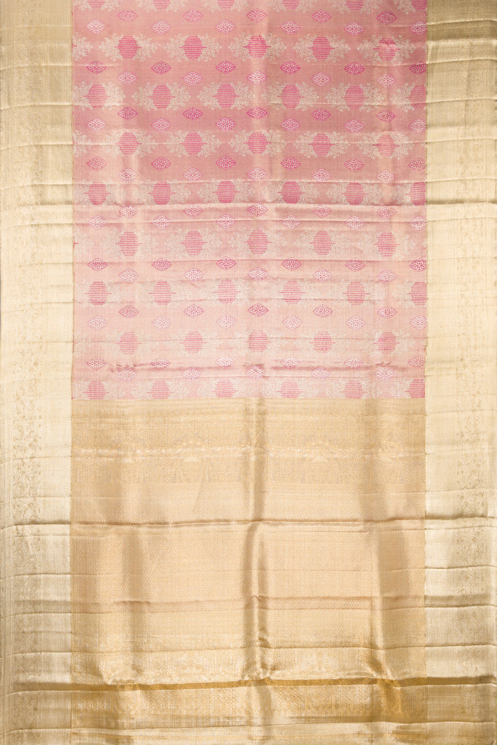 Flat view of Pink Dual Tone Kanjivaram Tissue Saree with Zari Brocade on the body and Fancy Border. 