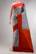 Pure Silk Grey Kanchipuram Saree with Thread Butta on the body and Thread Border.  displayed on a mannequin