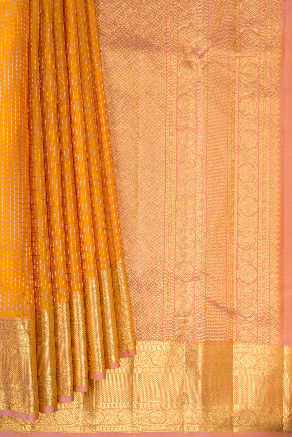 Pleats and pallu of Pure Silk Mustard Kanjivaram Saree with Checked design on the body and Zari Border. 