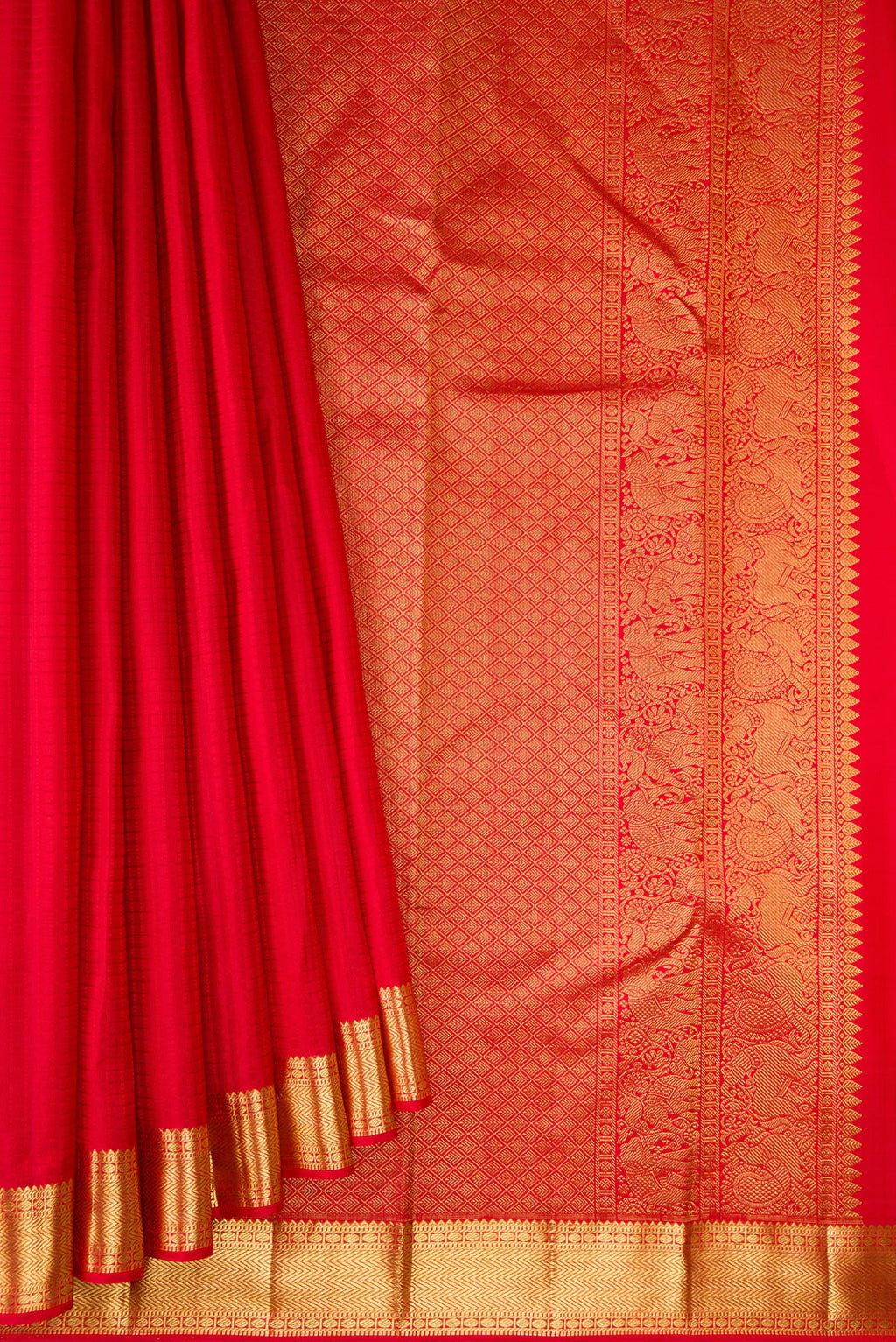 Pleats and pallu of Pure Silk Red Kanchipuram Saree with Checked design on the body and Zari Border. 