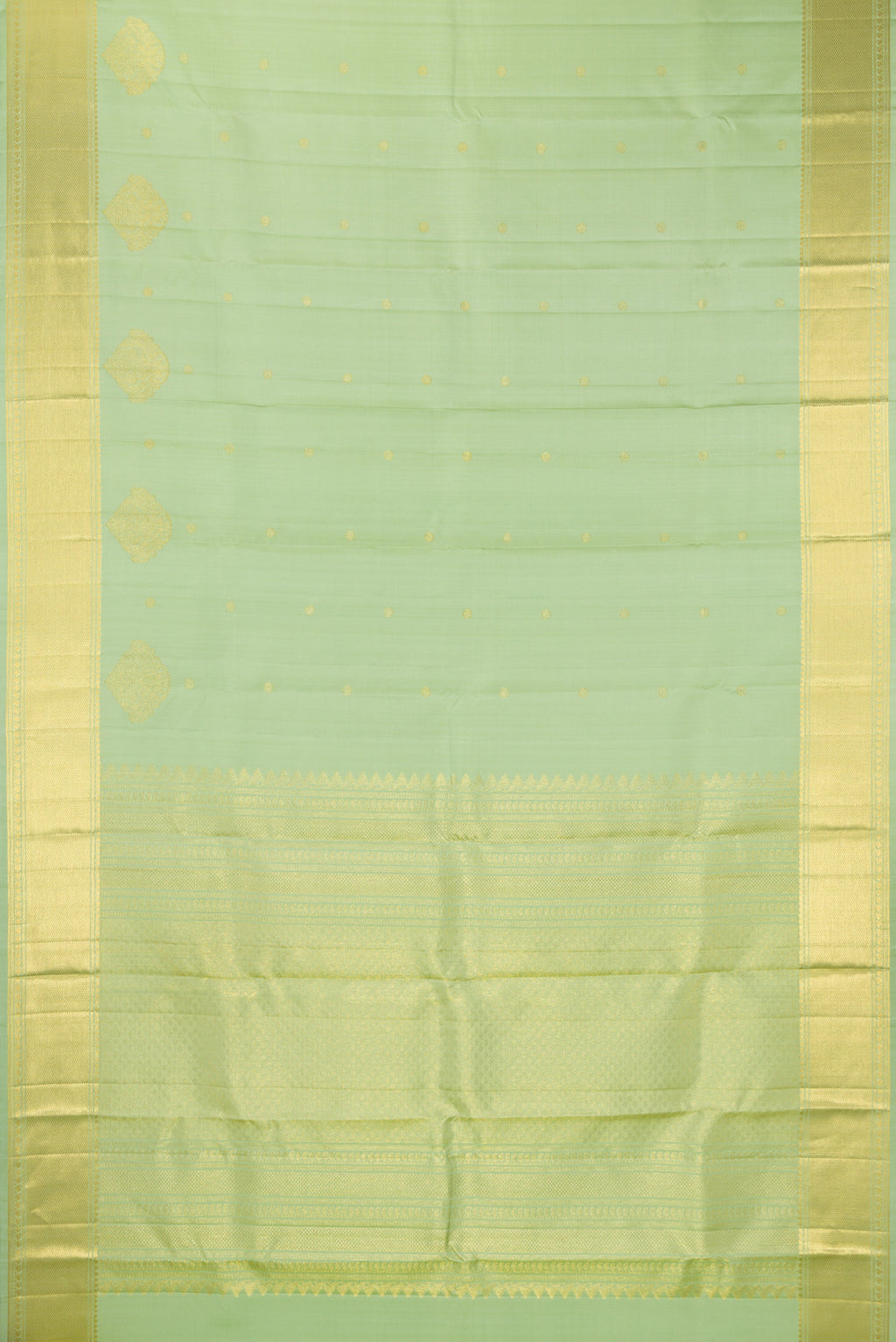 Flat view of Pure Silk Pista Green Kanchipuram Saree with Zari Butta on the body and Zari Border. 