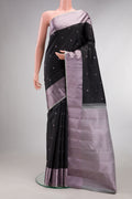Pure Silk Black Kanchipuram Saree with Thread Butta on the body and Thread Border.  displayed on a mannequin