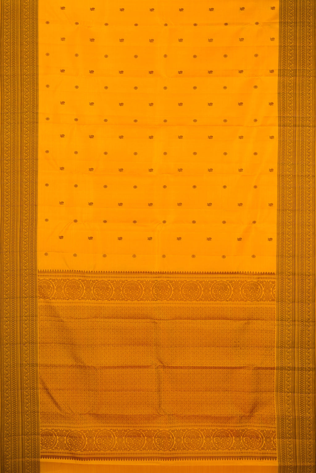 Flat view of Pure Silk Mustard Kanchipuram Saree with Thread Butta on the body and Thread Border. 