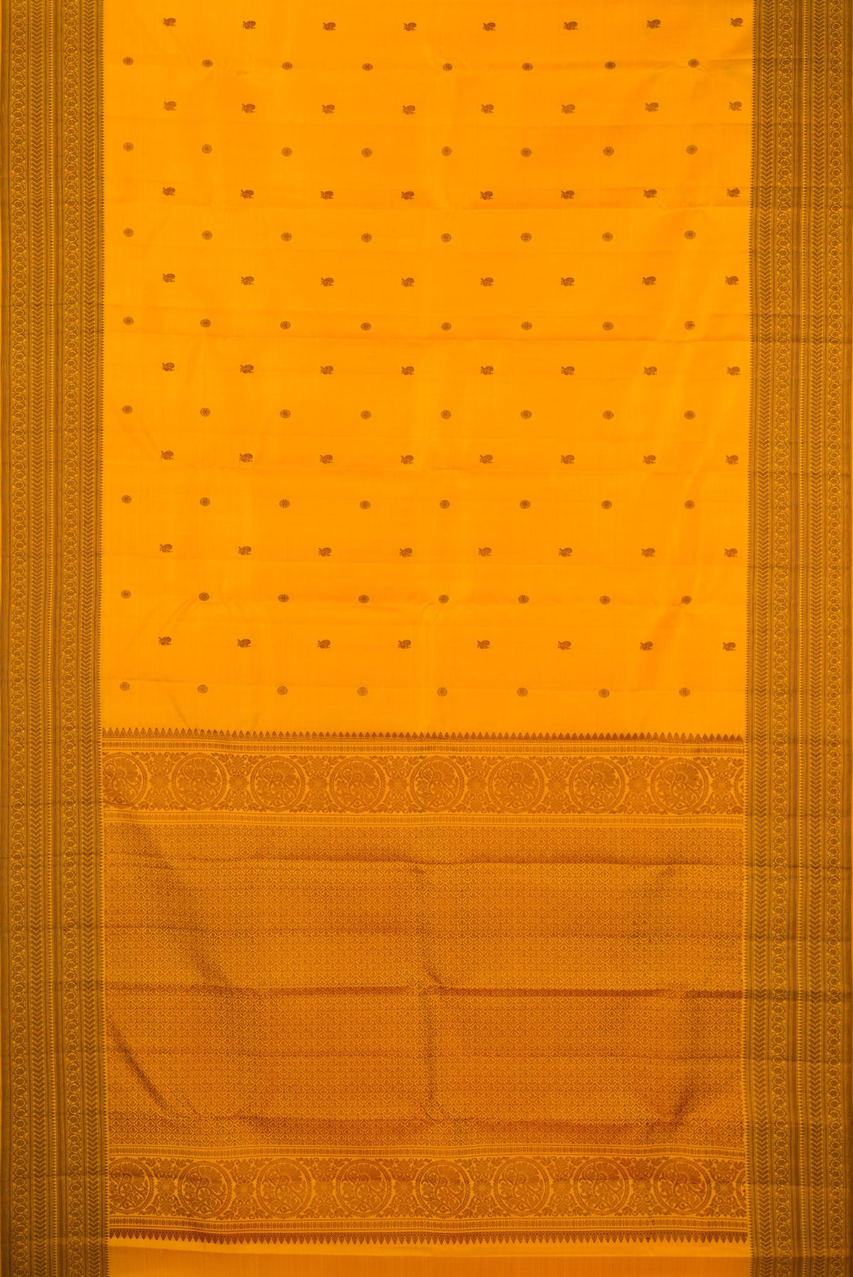 Flat view of Pure Silk Mustard Kanchipuram Saree with Thread Butta on the body and Thread Border. 