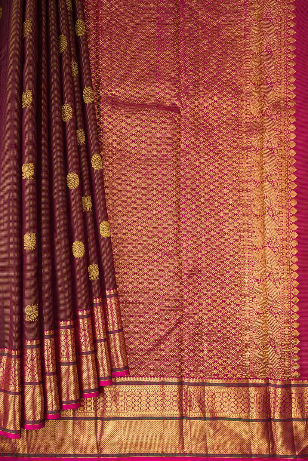 Pleats and pallu of Pure Silk Maroon Dual Tone Kanjivaram Saree with Stripes on the body and Zari Border. 