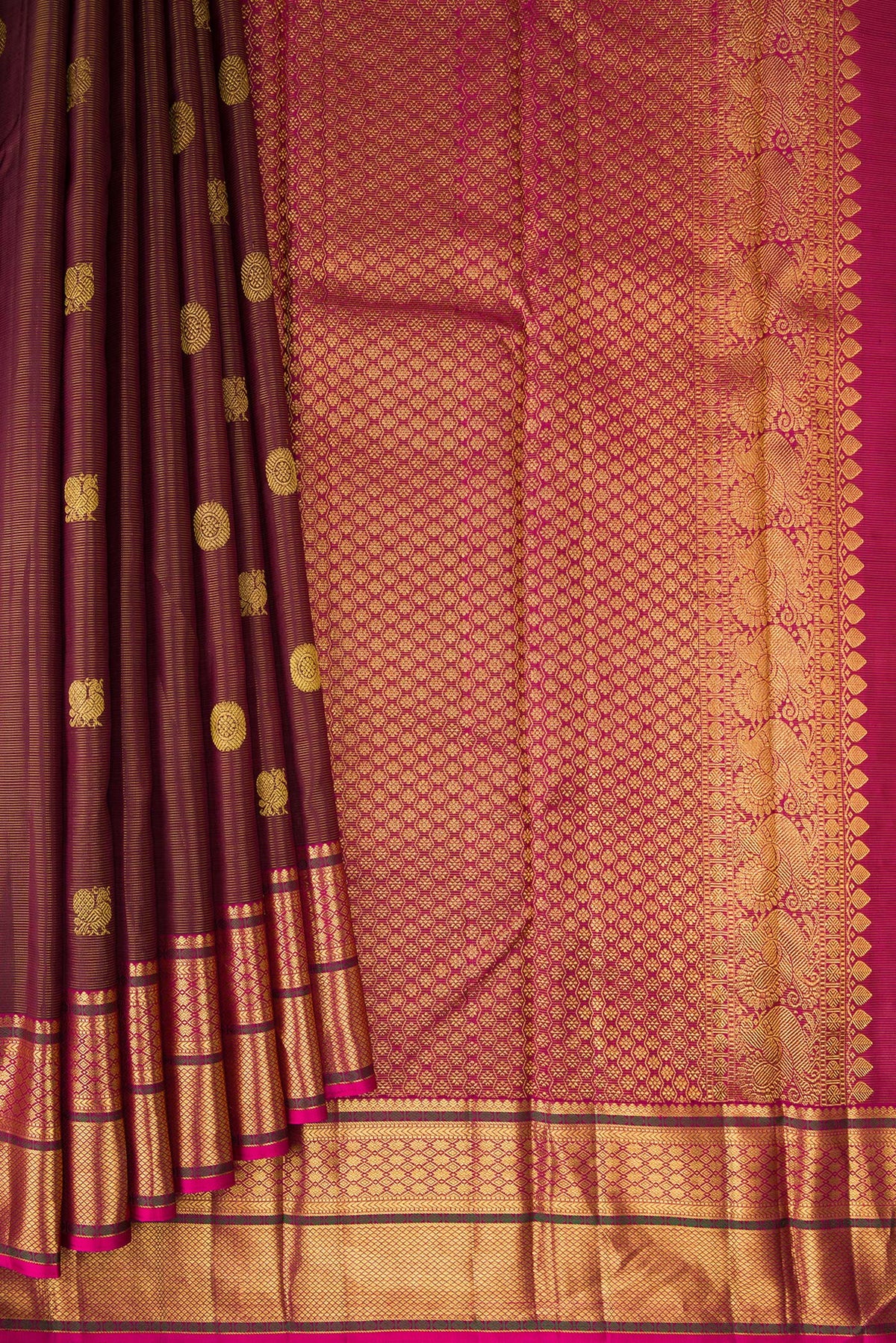Pleats and pallu of Pure Silk Maroon Dual Tone Kanjivaram Saree with Stripes on the body and Zari Border. 