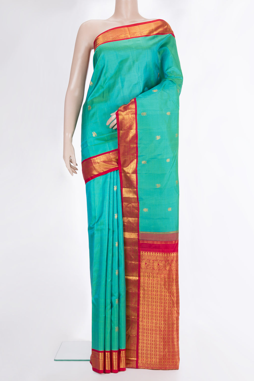 Pure Silk Sea Green Dual Tone Kanjivaram Saree with Zari Butta on the body and Zari Border.  displayed on a mannequin