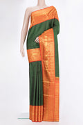 Pure Silk Bottle Green Kanchipuram Saree with Stripes on the body and Zari Border.  displayed on a mannequin