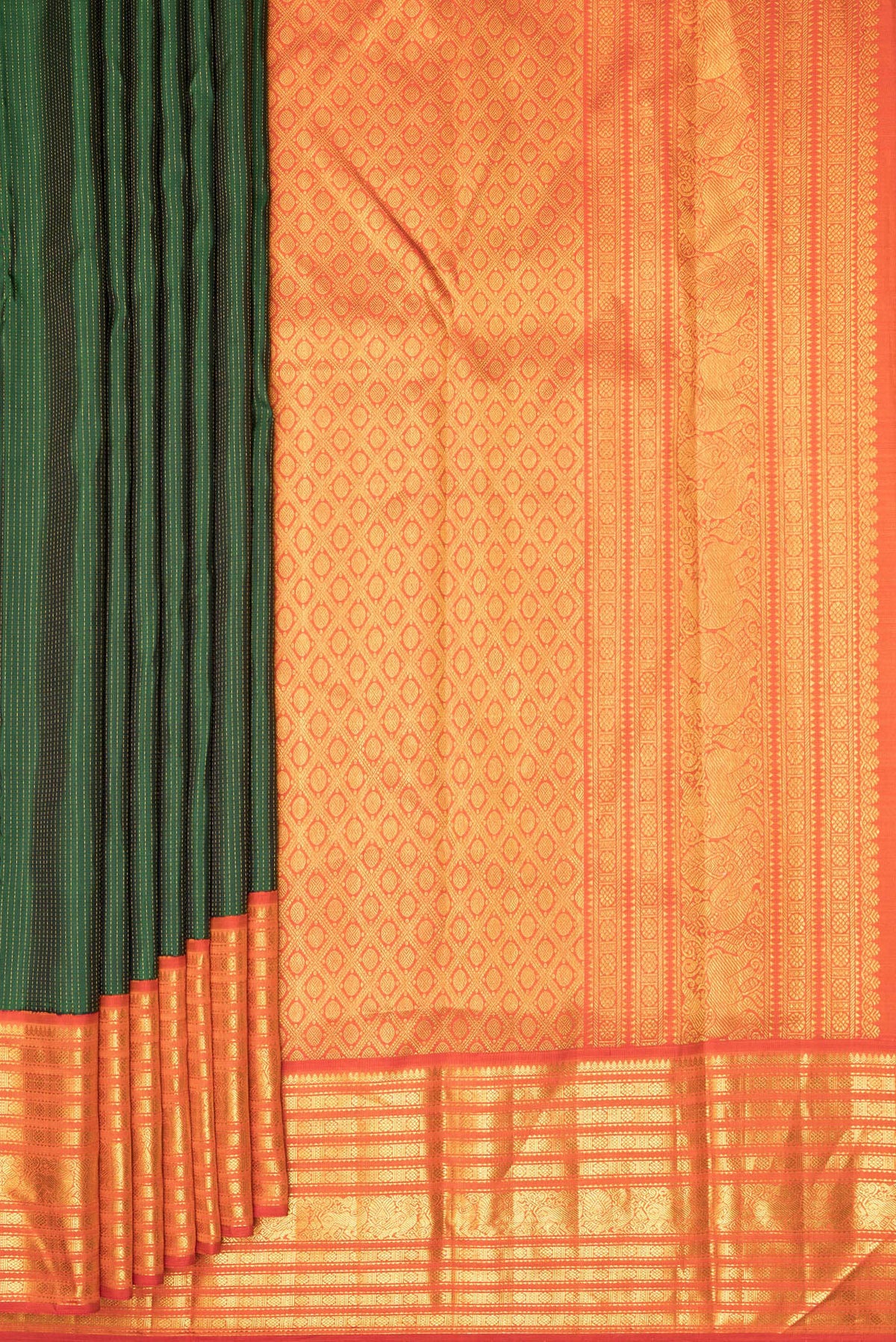 Pleats and pallu of Pure Silk Bottle Green Kanchipuram Saree with Stripes on the body and Zari Border. 