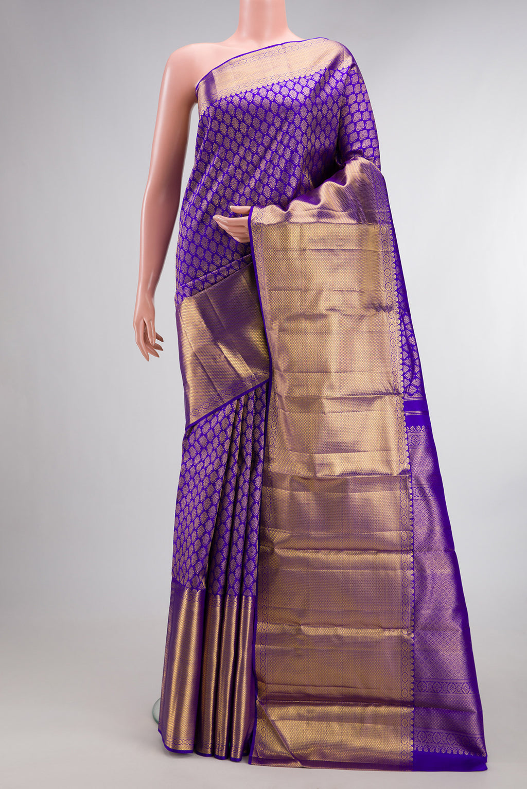 Pure Silk Royal Blue Kanchipuram Saree with Zari Brocade on the body and Zari Border.  displayed on a mannequin