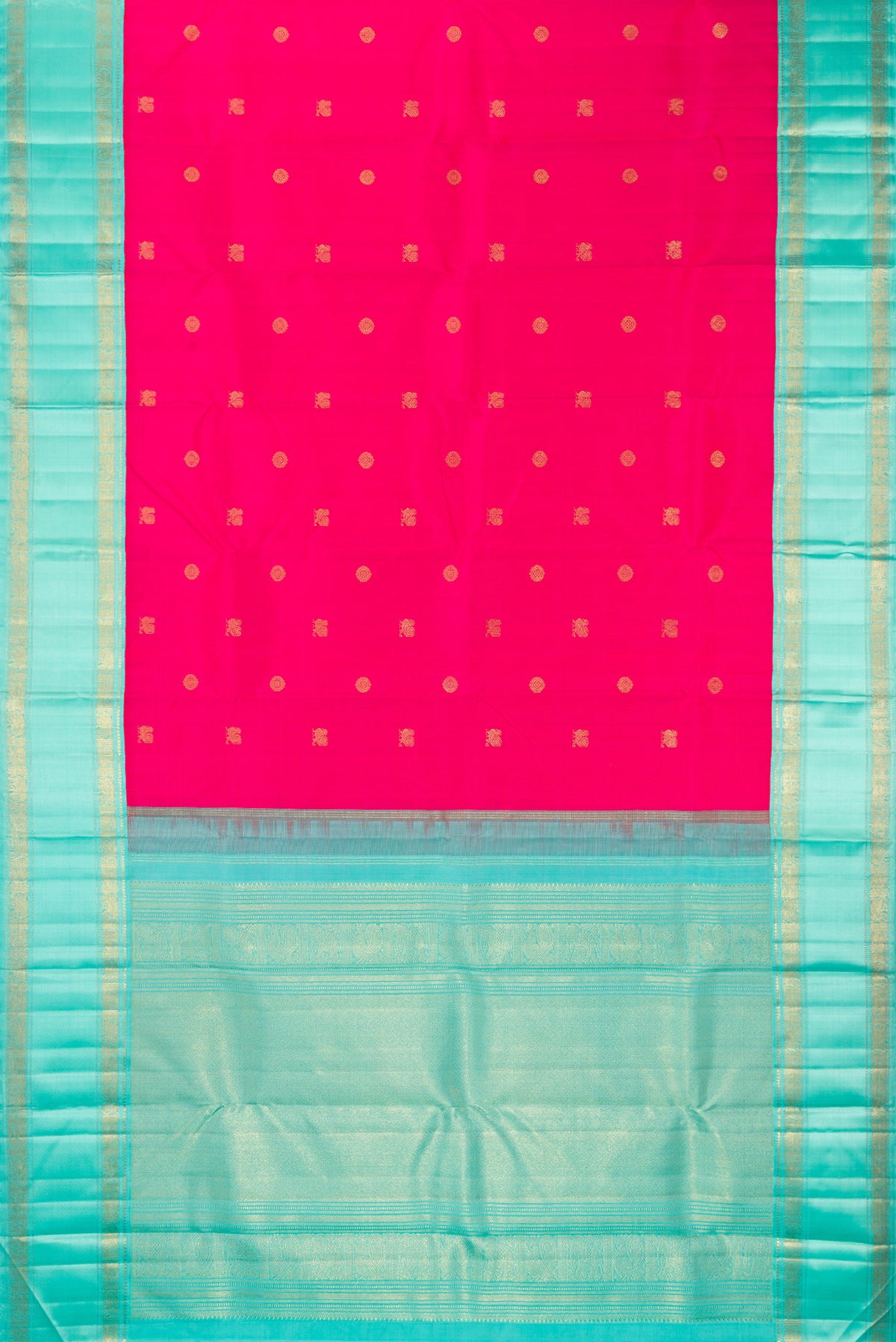 Flat view of Pure Silk Pure Zari Rani Pink Kanjivaram Saree with Zari Butta on the body and Zari Border. 