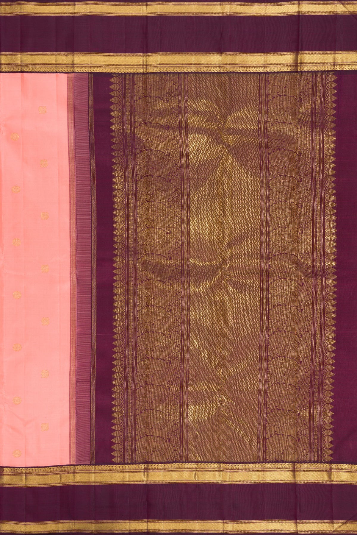 Close up image of the pallu of Pure Silk Pure Zari Peach Kanjivaram Saree with Zari Butta on the body and Zari Border. 