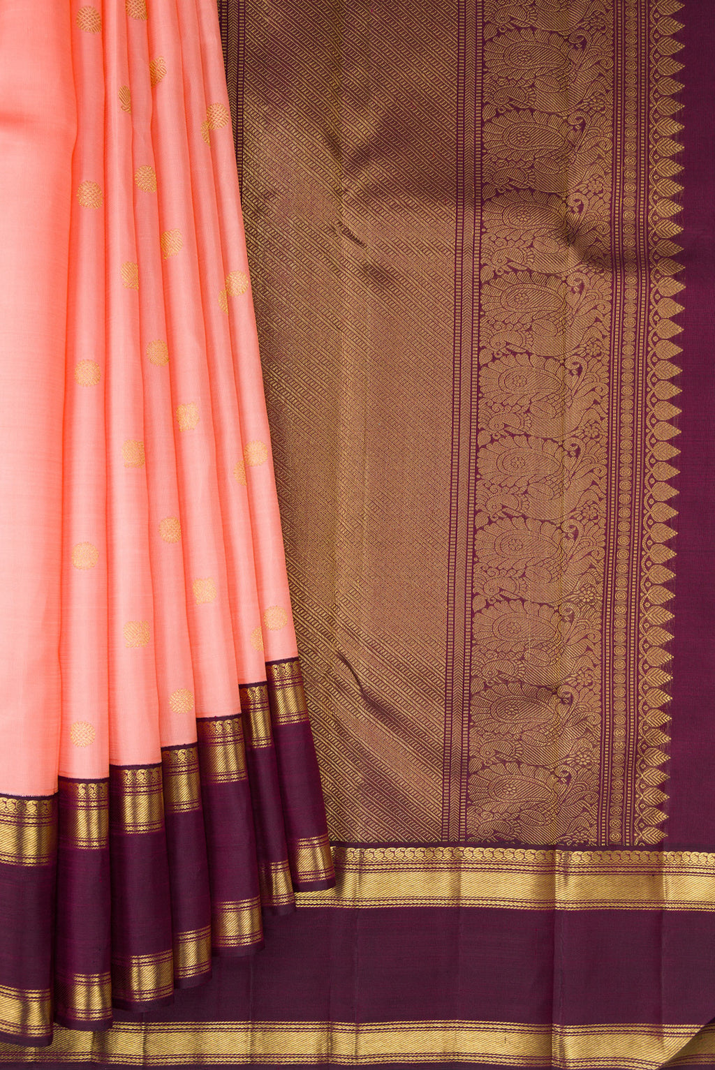 Pleats and pallu of Pure Silk Pure Zari Peach Kanjivaram Saree with Zari Butta on the body and Zari Border. 