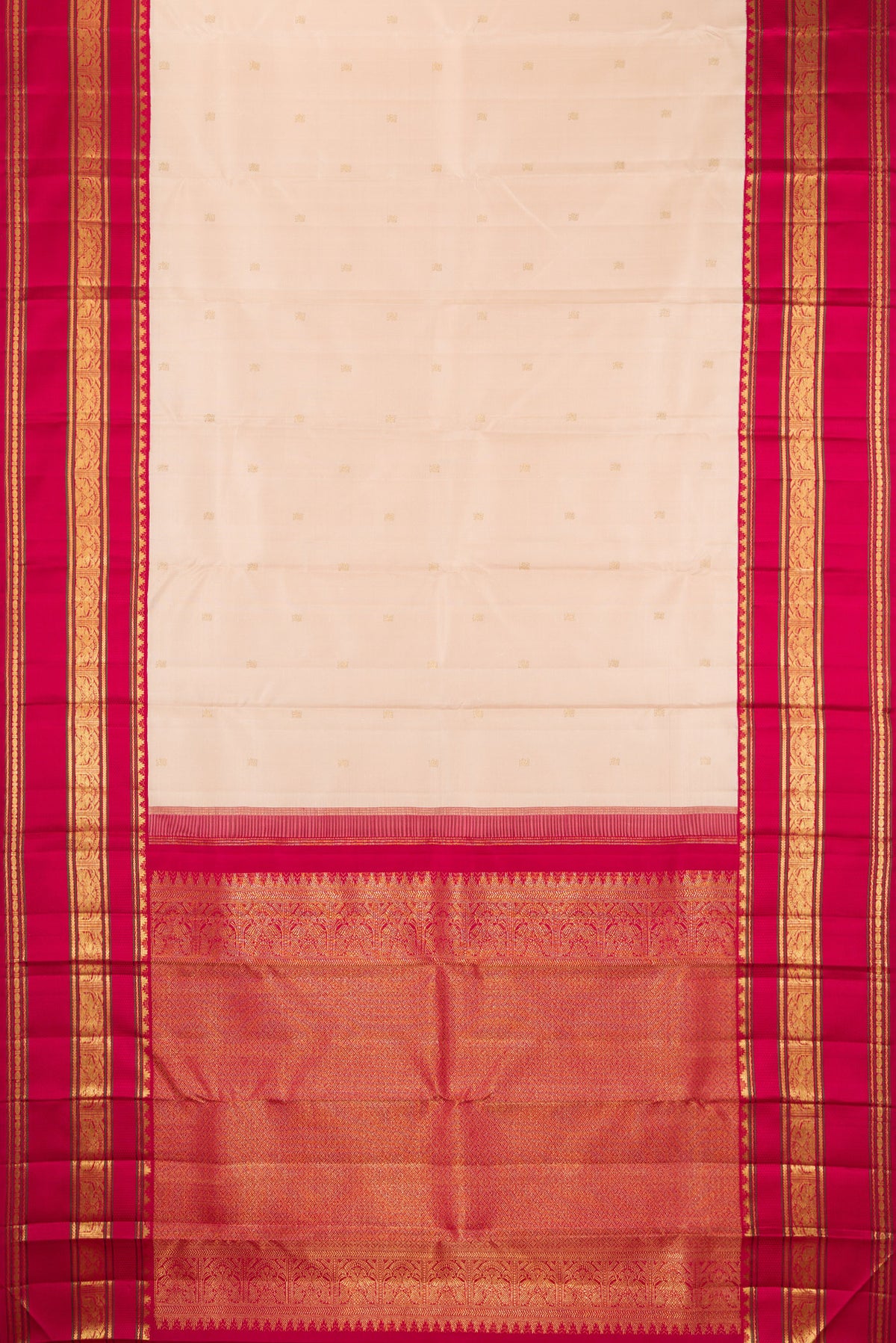 Flat view of Pure Silk Pure Zari Cream Dual Tone Kanjivaram Saree with Zari Butta on the body and Zari Border. 